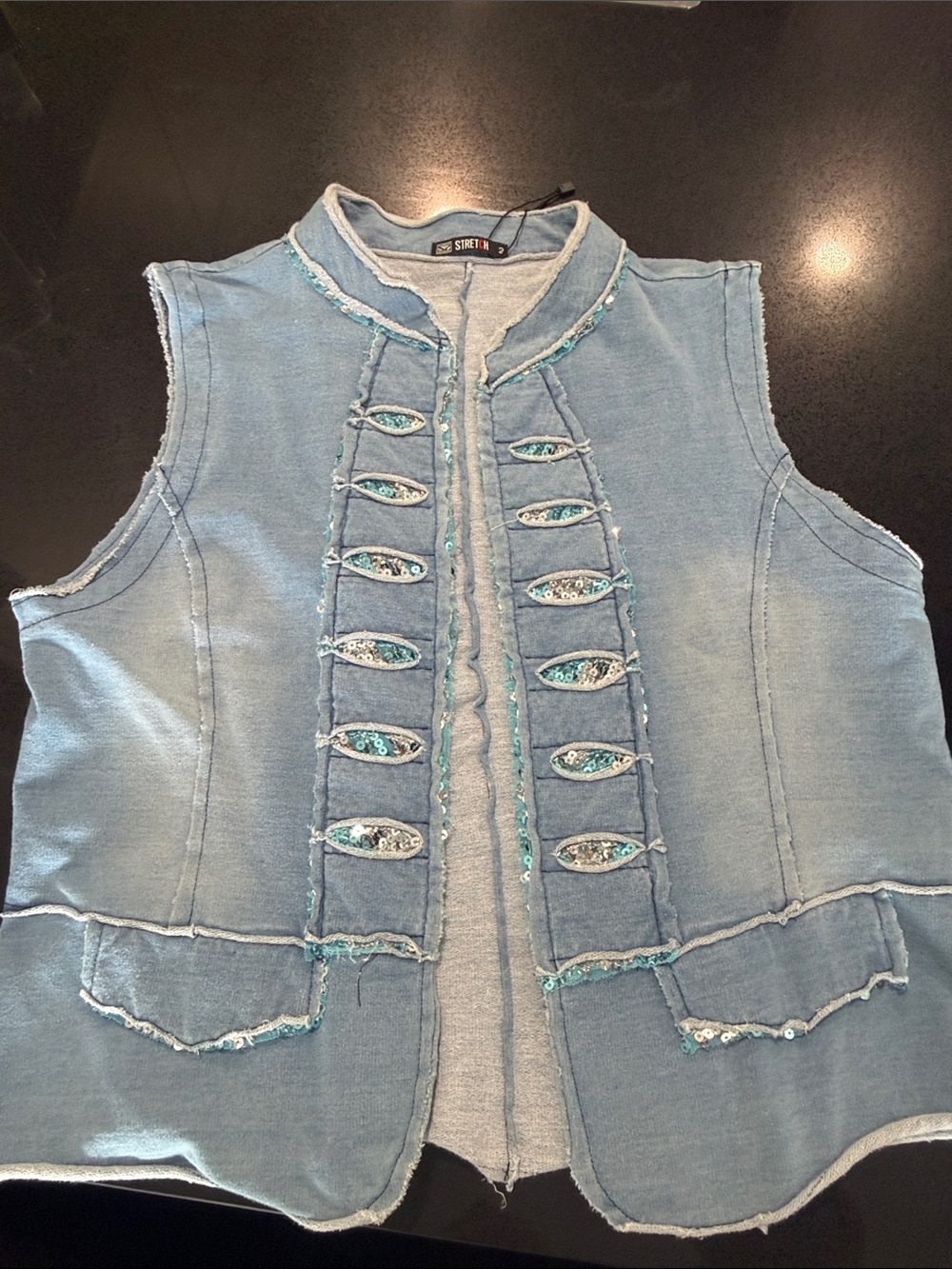 Sleeveless Light Blue Embellished Denim Vest by
